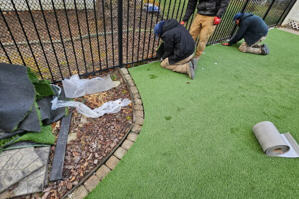 U.S. Lawns crew installing artificial turf at a property in Cleveland, Ohio