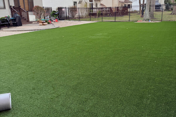 Close-up of new artificial turf during installation at a Cleveland, Ohio property
