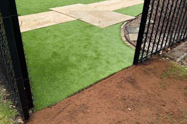 Artificial turf and paver walkway installation at a Cleveland, Ohio property